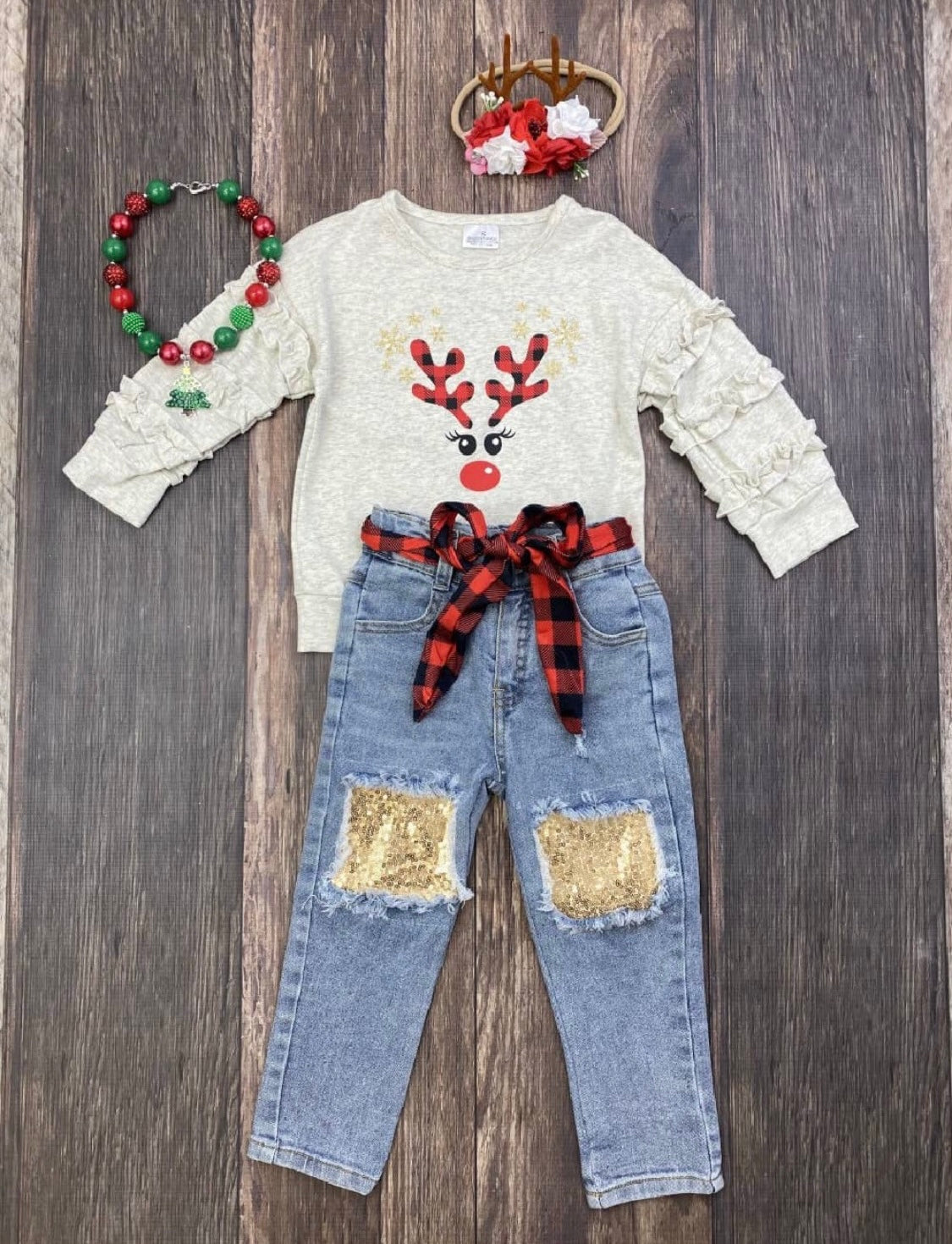 Reindeer shirt and cutout jeans
